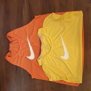 Two Nike dry fit tanks. Sold as a set.